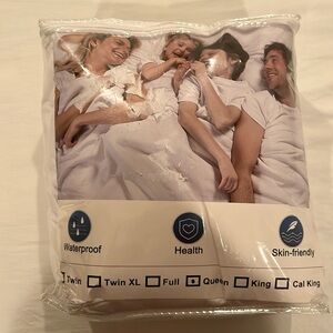 Brand new Queen size mattress pad. Never used!